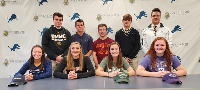 Pope John seniors, clockwise from top left, Dane Armstrong, Jake Wagner, Eddie Ventresca, Kaya Sement, Luke Chenault, Maura Campbell, Bridget McNally, Kelly Peter and Gianna Burrini each signed or committed to Division-I athletic programs on Wednesday morning at Pope John XXIII High School. [Photo by Andrew Tredinnick/New Jersey Herald (NJH)]