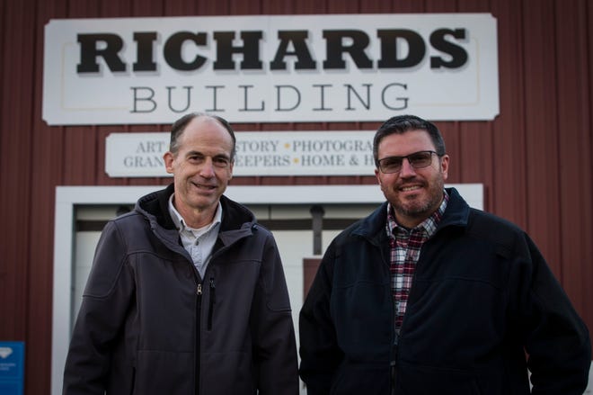 Kevin Mitchell, left, out-going manager of the Sussex County Fairgrounds, poses with Mike Richards, Newton Police chief and soon-to-be fairgrounds manager, outside of the fairgrounds' Richards Building, named for Mike Richards' grandfather Walter Richards. Richards announced Tuesday that he will be retiring from the Newton Police Department and will be taking over as manager of the fairgrounds in early 2020. [Photo by Daniel Freel/New Jersey Herald (NJH)]