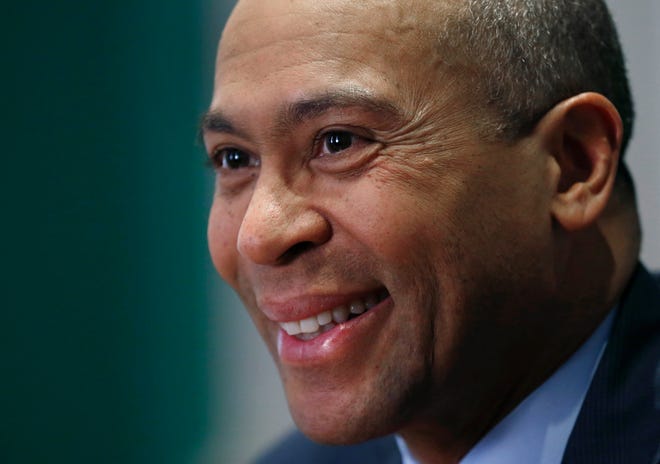 FILE - In this Dec. 15, 2014, file photo, Massachusetts Gov. Deval Patrick speaks during an interview at his Statehouse office in Boston. Former Massachusetts Gov. Patrick is considering making a late run for the Democratic presidential nomination. That is according to people with knowledge of Patrick’s deliberations. (AP Photo/Elise Amendola, File)