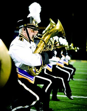 Frank Stanek performs with the Eagle Marching Band in 2014.