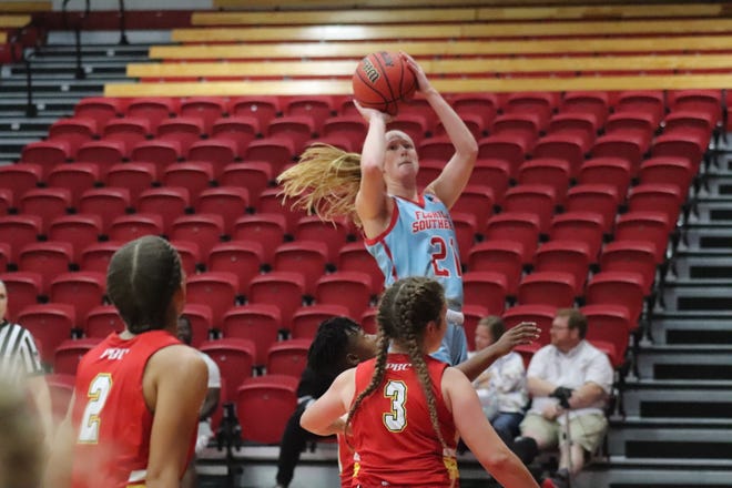 Florida Southern College’s Julia Jenike takes a shot over a Flagler player during the Moccasins’ 78-69 victory on Wednesday night at Jenkins Field House in Lakeland. [FLORIDA SOUTHERN ATHLETICS]