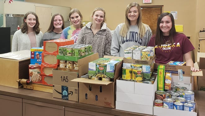 Lincoln Community High School students are busy collecting non-perishable food items for the Thanksgiving food drive. As of Wednesday, 853 items were collected and students are pushing to meet their goal of 3,000 items. Any community members or parents wishing to donate may drop off items at LCHS from 7:30 a.m. to 3:30 p.m. through Friday, Nov. 15. Students helping in the drive are from left: Grace Mathon, Madison Orebaugh, Karissa Bowman, Emily Paulus, Lauren Graue and Alexis Erb. [Photo courtesy of Abby Curry]