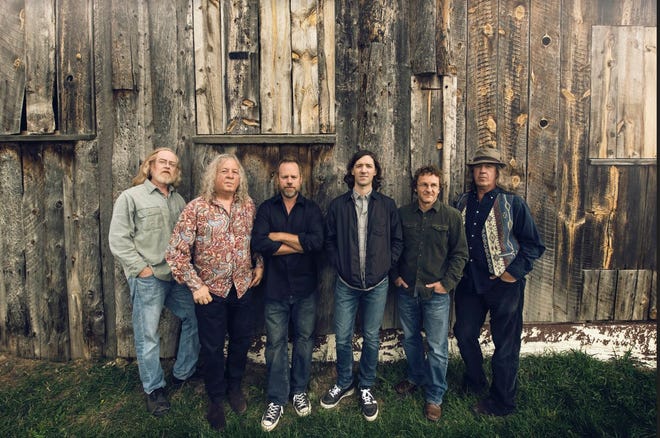 Railroad Earth will honor the legacy of the late Andy Goessling, at right, by raising funds for a school music program.