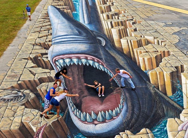 The organizers of Chalk Festival plans a massive reimagining of the 2014 Guinness World Record “Megalodon Shark” chalk painting when the event returns to Venice Friday through Monday. [Herald-Tribune staff photo by Thomas Bender / 2014]