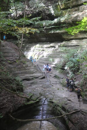 Visitors can hike to and into 18 canyons at Starved Rock State Park. [Steve Stephens/Columbus Dispatch]