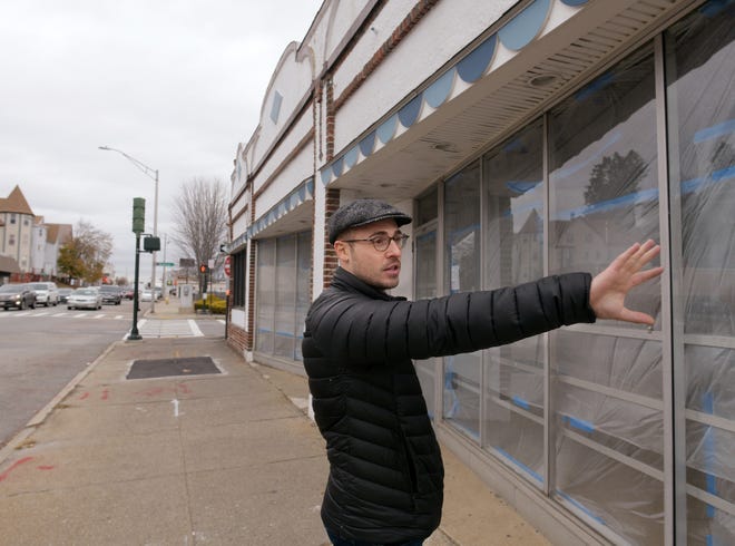 Alex Mazin, president and CEO of Bud's Goods and Provisions, stands in front of a storefront at 62 West Boylston St., Worcester, where his shop will open after an extensive renovation. [T&G Staff/Christine Peterson]
