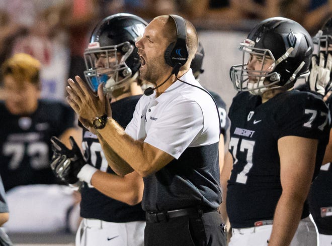 Vandegrift head coach Drew Sanders led the Vipers to a 14-13 win over Cypress Bridgeland Friday in the first round of the state playoffs. [JOHN GUTIERREZ/FOR STATESMAN]