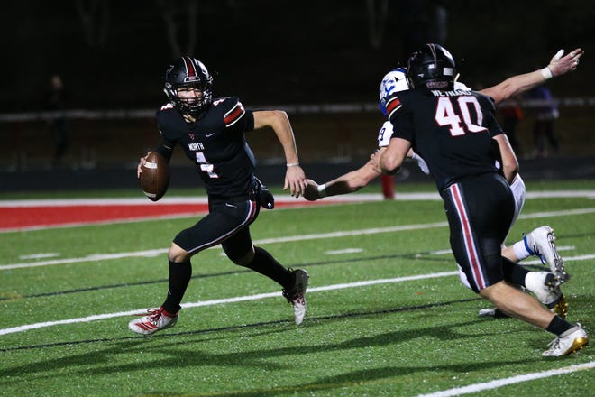 North Oconee's Bubba Chandler (4) searches for an open receiver during a game against Oconee County earlier this season. [File photo/Austin Steele, for the Athens Banner-Herald]
