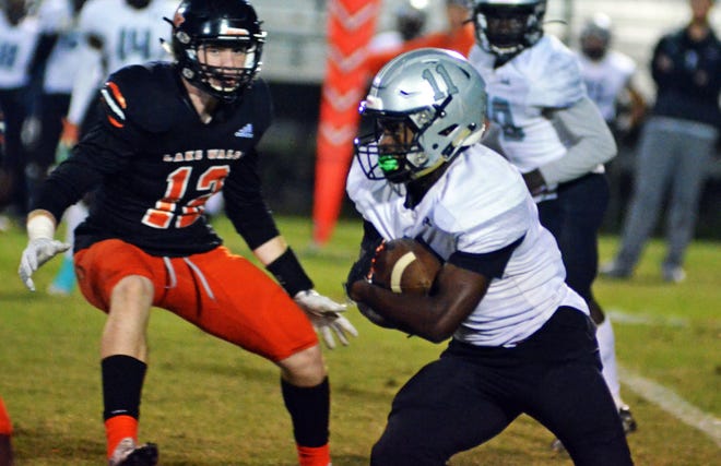 Atlantic running back Aaron Walton gained 155 yards on 19 carries with two touchdowns in Friday’s 36-21 loss to Lake Wales. [BILL KEMP/THE LEDGER]