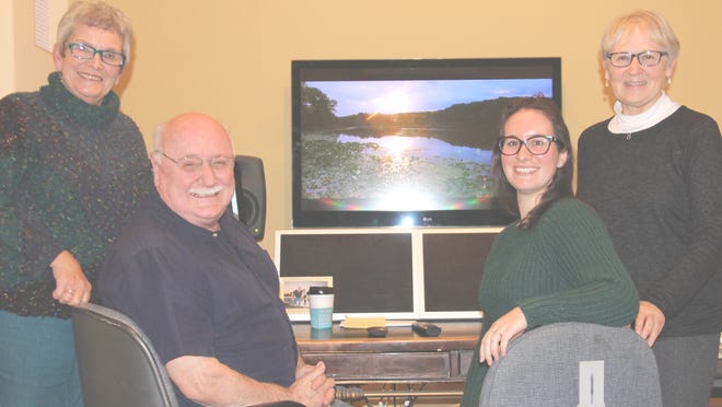 The “Dark Lake” team of Karen Yoder, Mike Mort, Jenifer Blouin Policelli and Dianne Gorsuch are preparing for the Nov. 22 premieer of the fourth film in the “Windows to Our Past” series. [Rosalie Currier Photo]