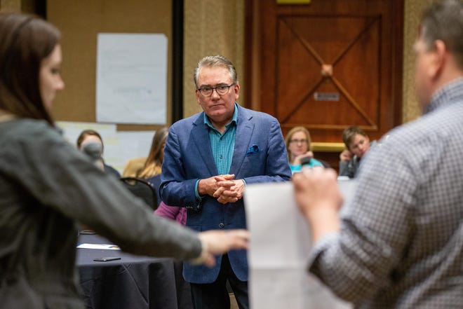Kevin Campbell, founder of the Center for Family Finding and Youth Connectedness, trains about 100 Kansas social workers Friday in a national model called “Family Finding." [Evert Nelson/The Capital-Journal]