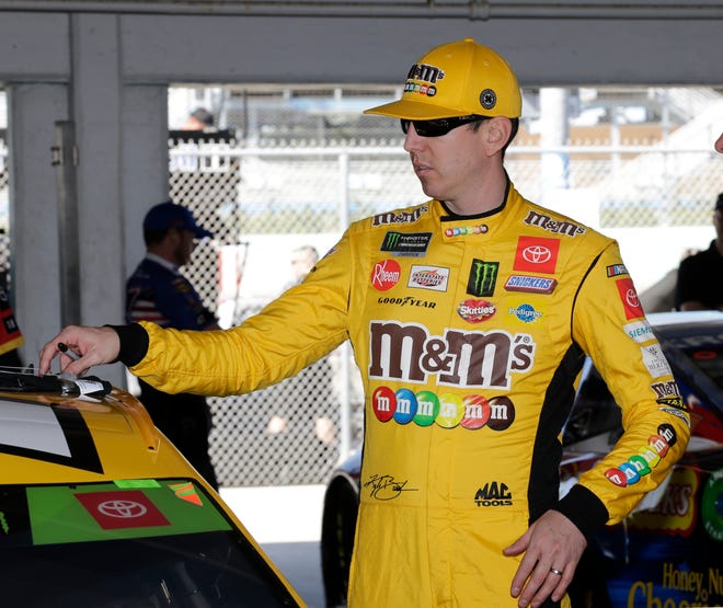 Kyle Busch prepares to practice for a NASCAR Cup Series auto race on Saturday, Nov. 16, 2019, at Homestead-Miami Speedway in Homestead, Fla. Busch is one of four drivers racing for the championship. (AP Photo/Terry Renna)