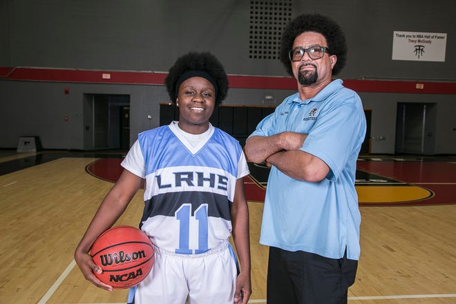 Lake Region girls basketball player Keyniesha Williams and Coach Jack Tisdale at Polk State College in Winter Haven during media day on Nov. 11.. Special to the Ledger/ Calvin Knight