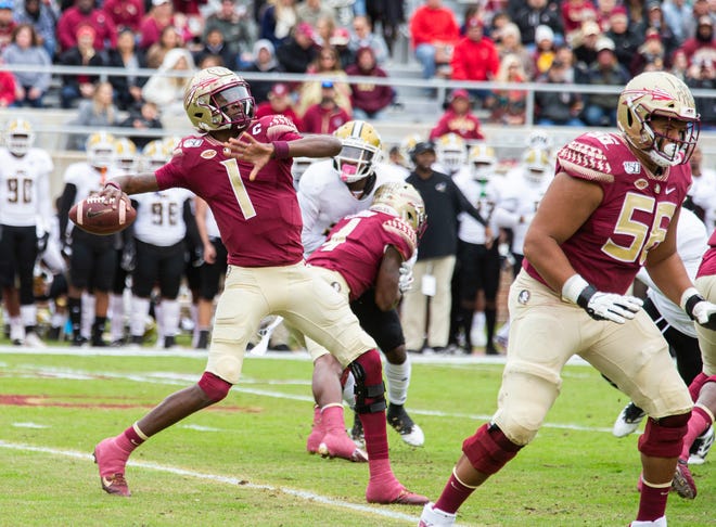 Florida State quarterback James Blackman winds up to throw a 69-yard touchdown pass on the first play from scrimmage in the first half against Alabama State on Saturday in Tallahassee. [Mark Wallheiser/The Associated Press]