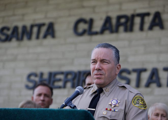 Los Angeles Sheriff Sheriff Alex Villanueva expresses his condolences for the victims of the shooting at Saugus High School at a news conference at the station Santa Clarita, Calif. [Damian Dovarganes/The Associated Press]