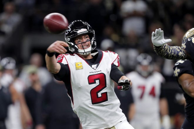 Atlanta Falcons quarterback Matt Ryan (2) passes under pressure against the Saints in New Orleans on Nov. 10. [GERALD HERBERT/THE ASSOCIATED PRESS]