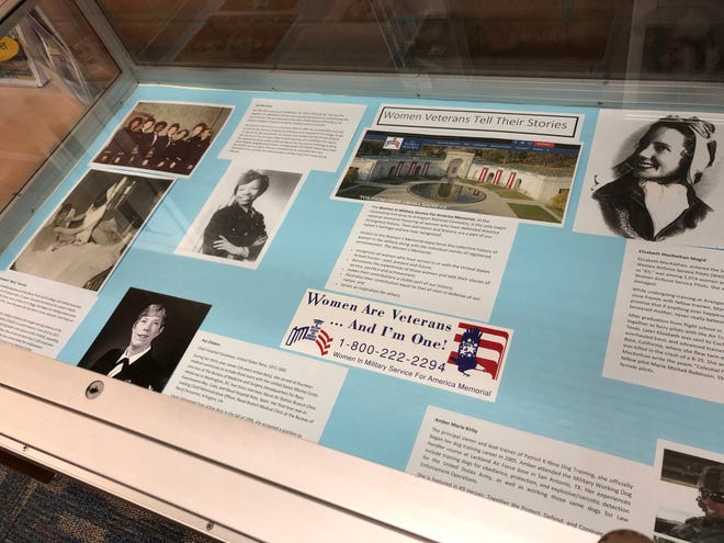 A Women in Military exhibit will be in display at the Cumberland County Library through Dec. 31., 2019. [Rachael Riley/The Fayetteville Observer]