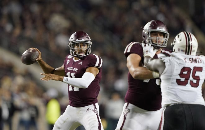 Texas A&M, led by Kellen Mond, has revived its season with four straight wins. With games left against Georgia and LSU, the Aggies could be a playoff spoiler. [DAVID J. PHILLIP/THE ASSOCIATED PRESS]