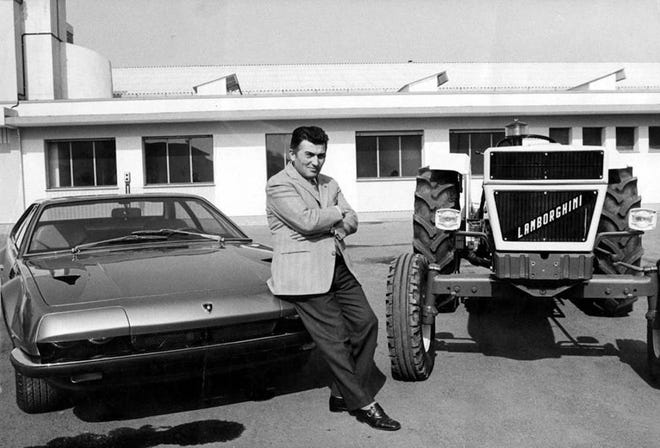 Ferruccio Lamborghini poses with his new V-12 powered sports car and one of the Lamborghini tractors. Upset with the lack of comfort and mechanical features of the Ferrari he purchased in 1958 and after a phone call to Ferrari, he decided to build his own super sports car. [Lamborghini]