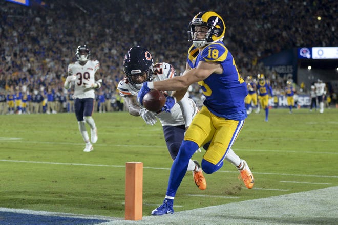 Los Angeles Rams wide receiver Cooper Kupp is pushed out of bounds at the goal line by Chicago Bears cornerback Buster Skrine during the first half on Sunday in Los Angeles. [KYUSUNG GONG/THE ASSOCIATED PRESS]
