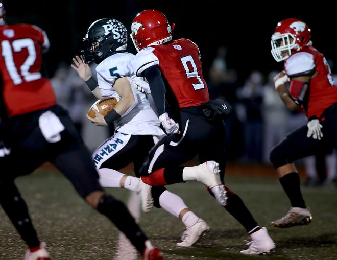 Plymouth South's Nick Siegelman rumbles off for a big gain to set up their first score in the first quarter of their game against Milton in the Division 4 South final at Milton High on Friday, Nov. 15, 2019. [Wicked Local Staff Photo/ Robin Chan]