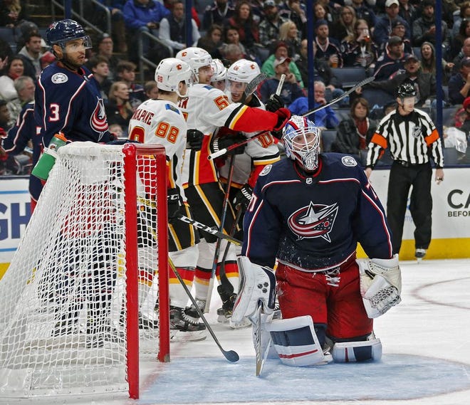 Calgary Flames center Sam Bennett (93) celebrates after scoring on Columbus Blue Jackets goaltender Joonas Korpisalo (70) in the 2nd period of their game at Nationwide Arena on Nov. 2.