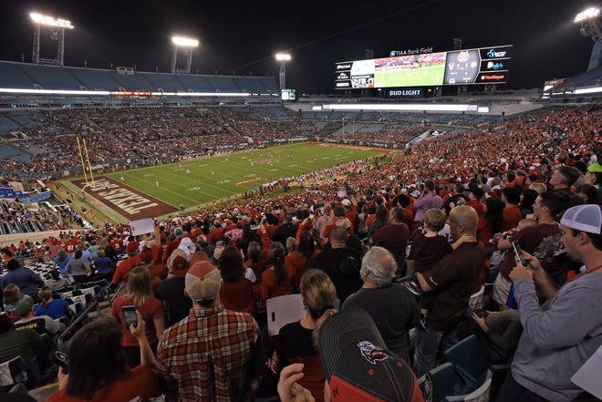 The crowd at last year’s TaxSlayer Gator Bowl between N.C. State and Texas A&M at TIAA Bank Field was the lowest in 64 years. [Bob Self/Florida Times-Union]
