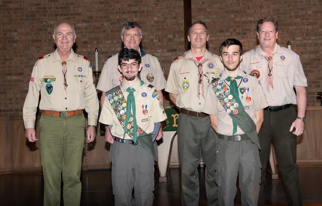 Pictured in the back row are Smitty Hanks, Assistant Scoutmaster; Dirk Klasing, Scoutmaster; Mark Paschall, Scoutmaster; and Wil Neumann, Assistant Scoutmaster. The Eagle recipients are Christopher Schiavoni, on left, and Caleb Davis. [SUBMITTED PHOTO]