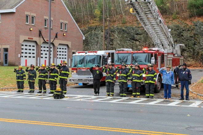 Millbury firefighters joined thousands of other fire departments to honor Worcester Lt. Jason Menard who was given a deserved hero’s sendoff at St. John Church in Worcester Monday, Nov. 18. [Submitted Photo]