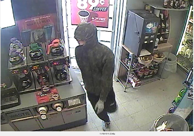 Security cameras capture images of armed gunmen entering areas businesses to rob them in Canton during 13 hours Monday.