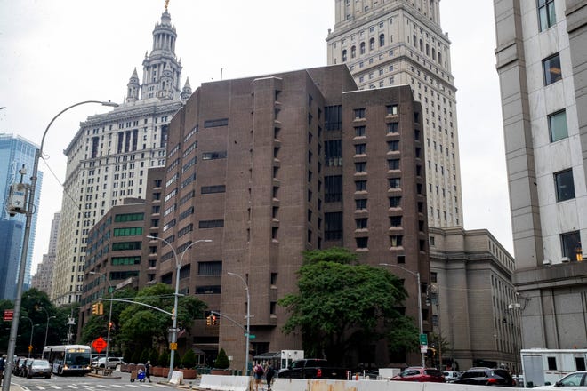 Two guards at Metropolitan Correctional Center, where Jeffrey Epstein took his own life, were charged with falsifying prison records. [Mary Altaffer/The Associated Press]