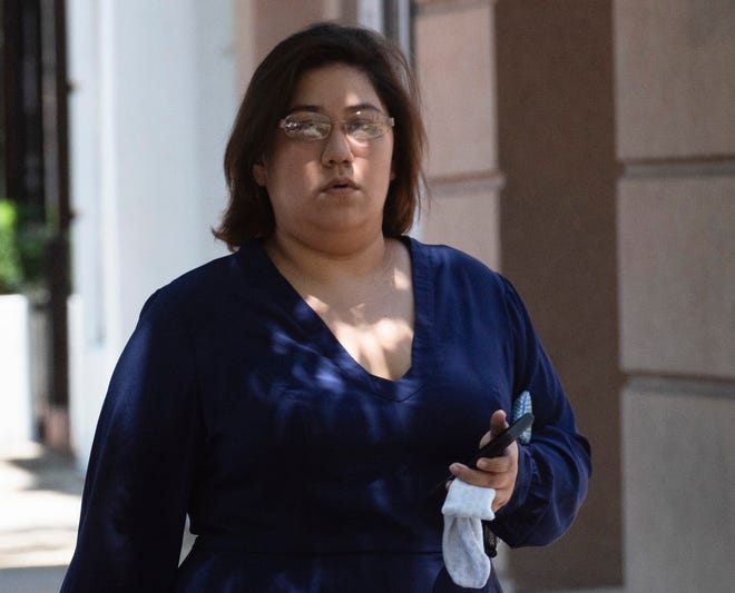 Amanda Kondrat'yev, the woman accused of throwing a sports drink at U.S. Rep. Matt Gaetz in June outside a town hall meeting, was sentenced to 15 days in federal jail. [Tony Giberson/Pensacola News Journal via AP]