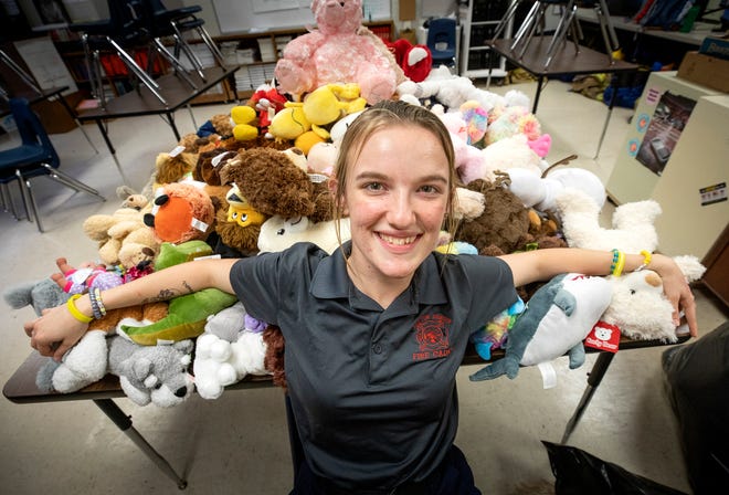 Hannah Jenkins, a senior at Bartow High School’s Medical and Fire Academy, has collected nearly 200 stuffed animals at the school to comfort children enduring a traumatic situation. [ERNST PETERS/THE LEDGER]