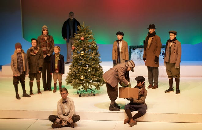 Drew Carlson, front, and Doug Rankin, back, are the co-leads for "A Child's Christmas in Wales," which runs Thursday through Sunday at Wells Theatre at Monmouth College. [JANE CARLSON/THE REGISTER-MAIL]