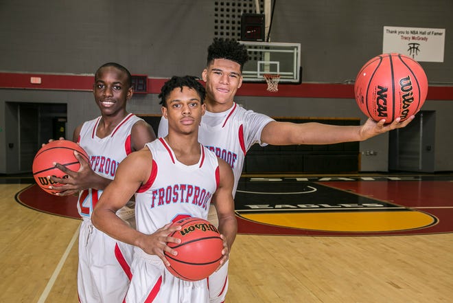 Frostproof’s Devontre Chaney, Charles Rowell and Antoine Cobb lead the Bulldogs into the upcoming season. [CALVIN KNIGHT/SPECIAL TO THE LEDGER]
