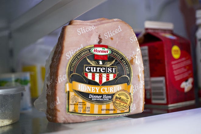 An outbreak of African swine flu has prices for ham skyrocketing in time for the Thanksgiving and Christmas holidays. (Bloomberg/Daniel Acker)
