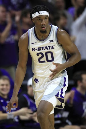 Kansas State forward Xavier Sneed was 5 of 10 on 3-pointers and scored a team-high 21 points Tuesday night to lead the Wildcats to a 62-51 victory against Arkansas-Pine Bluff at Bramlage Coliseum in Manhattan. [Orlin Wagner/The Associated Press]