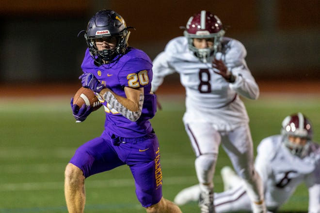Liberty Hill running back Trey Seward looks for more yards during the Panthers’ 66-7 win over La Feria in a Class 4A DI high school area playoff game in San Antonio Friday. Seward finished the game with 289 yards on 16 carries. [Stephen Spillman for Statesman]