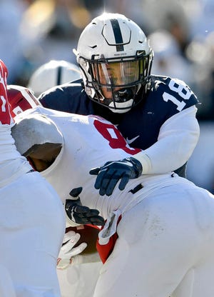 Penn State defensive end Shaka Toney, making a tackle during the Nittany Lions’ 34-27 win over Indiana last week, has 6.5 sacks this season. [Abby Drey/Centre Daily Times/TNS]