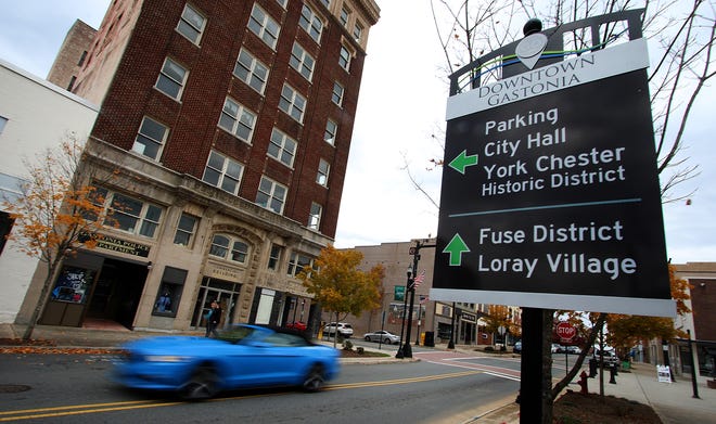 One of the new 'wayfinding' signs that have recently been installed around downtown Gastonia. [Mike Hensdill/The Gasston Gazette]