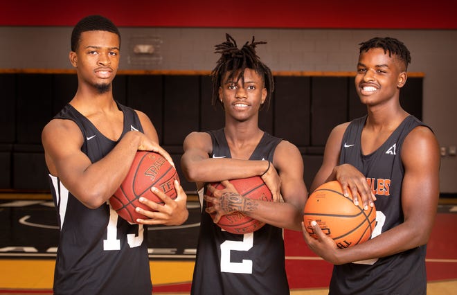 New Lake Wales coach Bobby Banks will build his first team around, from left, Isaiah Telot, Donald Gatlin and Cory Wright Jr. [ERNST PETERS/THE LEDGER]