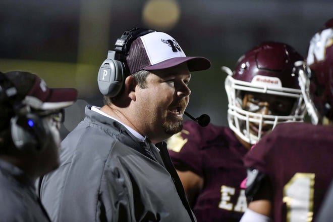 Niceville Coach Grant Thompson talks to his team during Friday night's game against West Florida High School at Niceville. [DEVON RAVINE/DAILY NEWS]