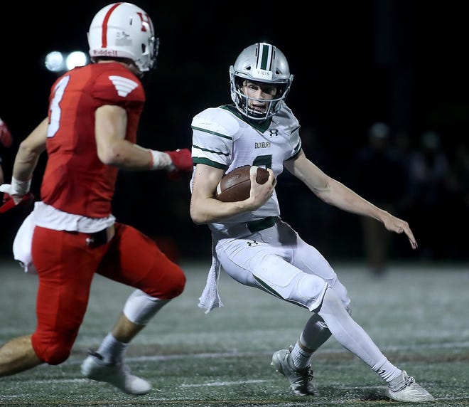 Duxbury's Will Prouty looks to make a cut to avoid the defense during a run in the second quarter of their game against Hingham at Hingham on Friday, Sept. 27, 2019. [Wicked Local Staff Photo/ Robin Chan]