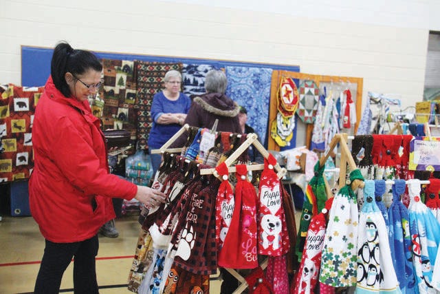 Shoppers check out one of the booths during a past Holiday Craft Show in the McCreary Community Building. The event will return on Saturday, Nov. 19.