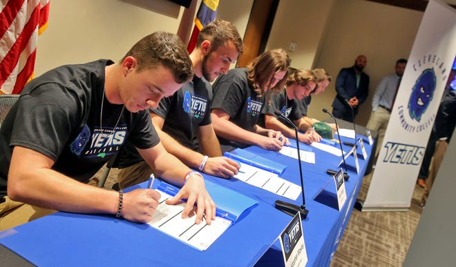 From left, Christopher Moxley, Avery Bridges, Chase Williams, Michael Greene and Zachary Wilson sign to play baseball at Cleveland Community College on Thursday. [Brittany Randolph/The Star]