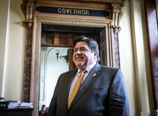 Illinois Governor J.B. Pritzker stands outside his office after meeting with Chicago Mayor-elect Lori Lightfoot at the Illinois State Capitol, Wednesday, April 10, 2019, in Springfield, Ill. [Justin L. Fowler/The State Journal-Register]