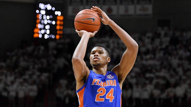 Florida's Kerry Blackshear Jr. had 20 points and 11 rebounds as the Gators beat state rival Miami 78-58 Friday to advance to the Charleston Classic championship. [Jessica Hill/Associated Press/File]