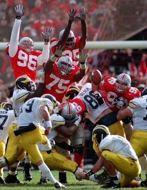 Michigan took the lead for good on a field by Remy Hamilton and went on to defeat Ohio State 13-9 during the 1996 season. [File photo]