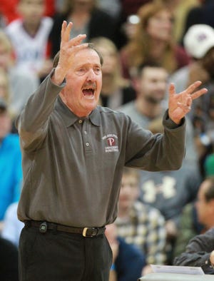FILE - In this Feb. 3, 2015, file photo, Philadelphia University's Herb Magee gestures during the team's game against Wilmington in Philadelphia. Magee joined Duke coach Mike Krzyzewski as the only NCAA men's coaches to win 1,100 basketball games. Krzyzewski has 1,138 wins (1,065 with Duke) in a career that started with Army in 1975. Magee hit the magic number this week when Jefferson University (the new name for Philadelphia University) beat Kutztown 98-79 in front of maybe 1,000 fans at home on Henry Avenue. (Charles Fox/The Philadelphia Inquirer via AP, File)