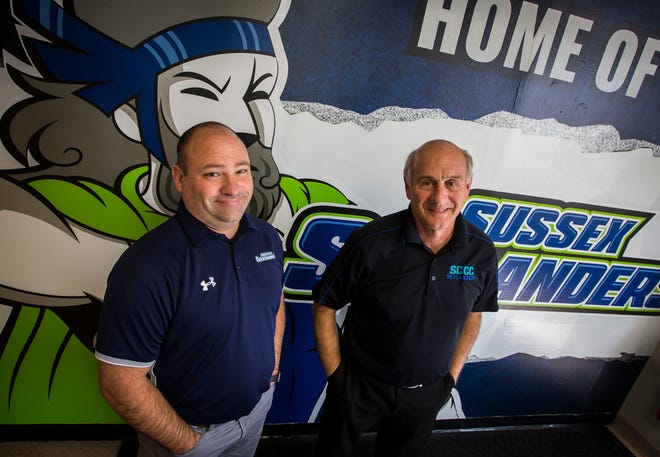 Todd Poltersdorf, Sussex County Community College;s director of admissions, left, and Skylanders Athletic Director John Kuntz are seen outside of the college's athletic department offices on Thursday. SCCC recently announced plans to implement a football program to compete during the 2020 season. The addition of the program will be put to a vote by the school’s Board of Trustees on Tuesday. [Photo by Daniel Freel/New Jersey Herald (NJH)]